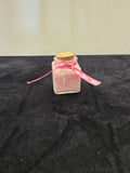 bougies en pot de verre pétales de rose